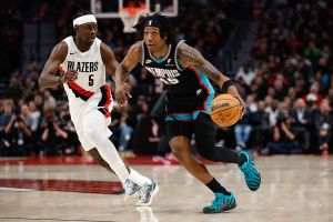 PORTLAND, OREGON - FEBRUARY 06: GG Jackson II #45 of the Memphis Grizzlies controls the ball against Jrue Holiday #5 of the Portland Trail Blazers during the third quarter of the game at Moda Center on February 06, 2026 in Portland, Oregon. The Portland Trail Blazers won 135-115. NOTE TO USER: User expressly acknowledges and agrees that, by downloading and or using this photograph, User is consenting to the terms and conditions of the Getty Images License Agreement. (Photo by Alika Jenner/Getty Images)