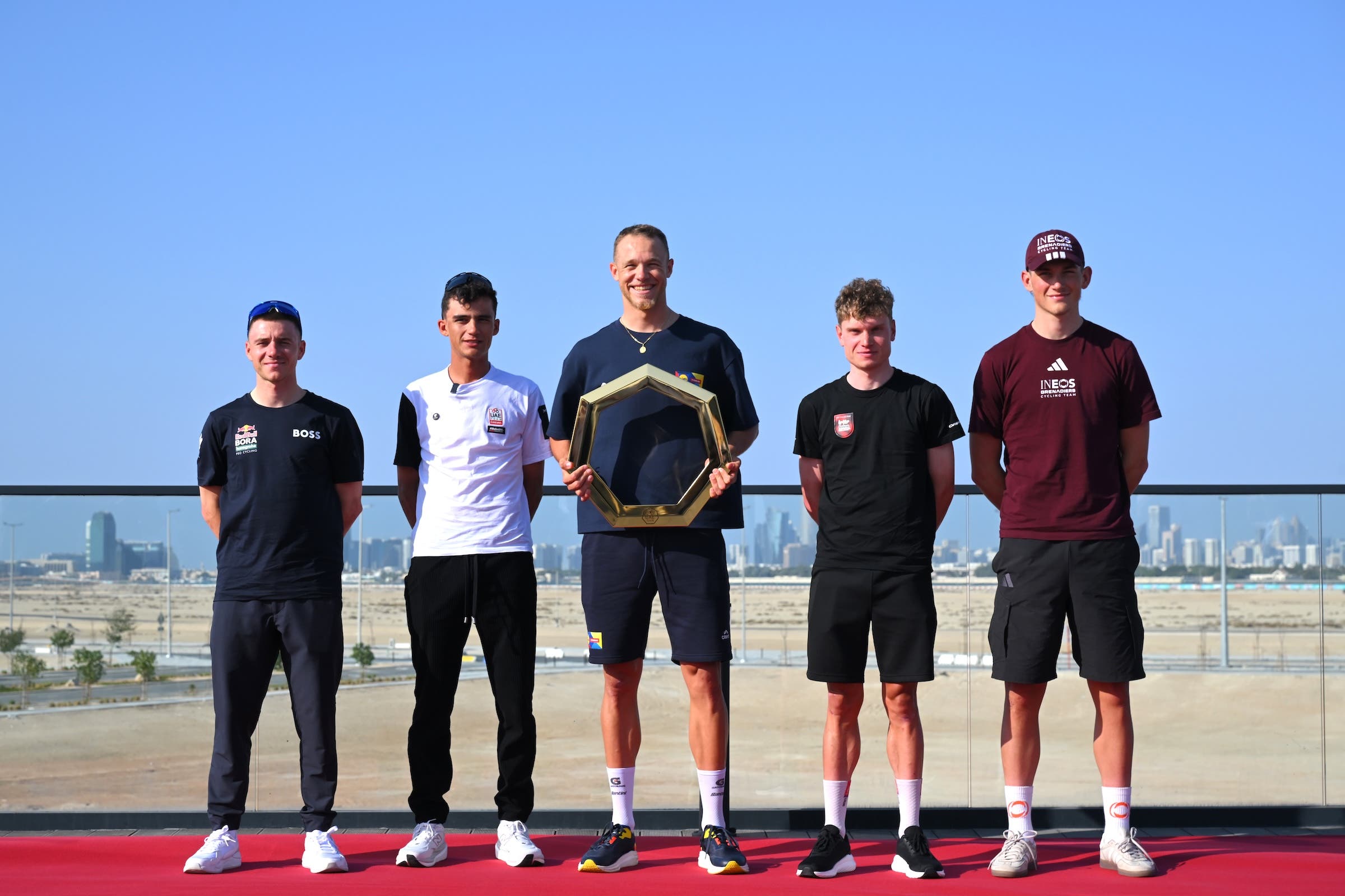 Remco Evenepoel (Red Bull-Bora-Hansgrohe), Isaac Del Toro (UAE Emirates-XRG), Jonathan Milan (Lidl - Trek), Lennert van Eetvelt (Lotto Intermarché) and Joshua Tarling (Ineos Grenadiers) one day before the start of the UAE Tour 2026 (Photo: Tim de Waele/Getty Images)