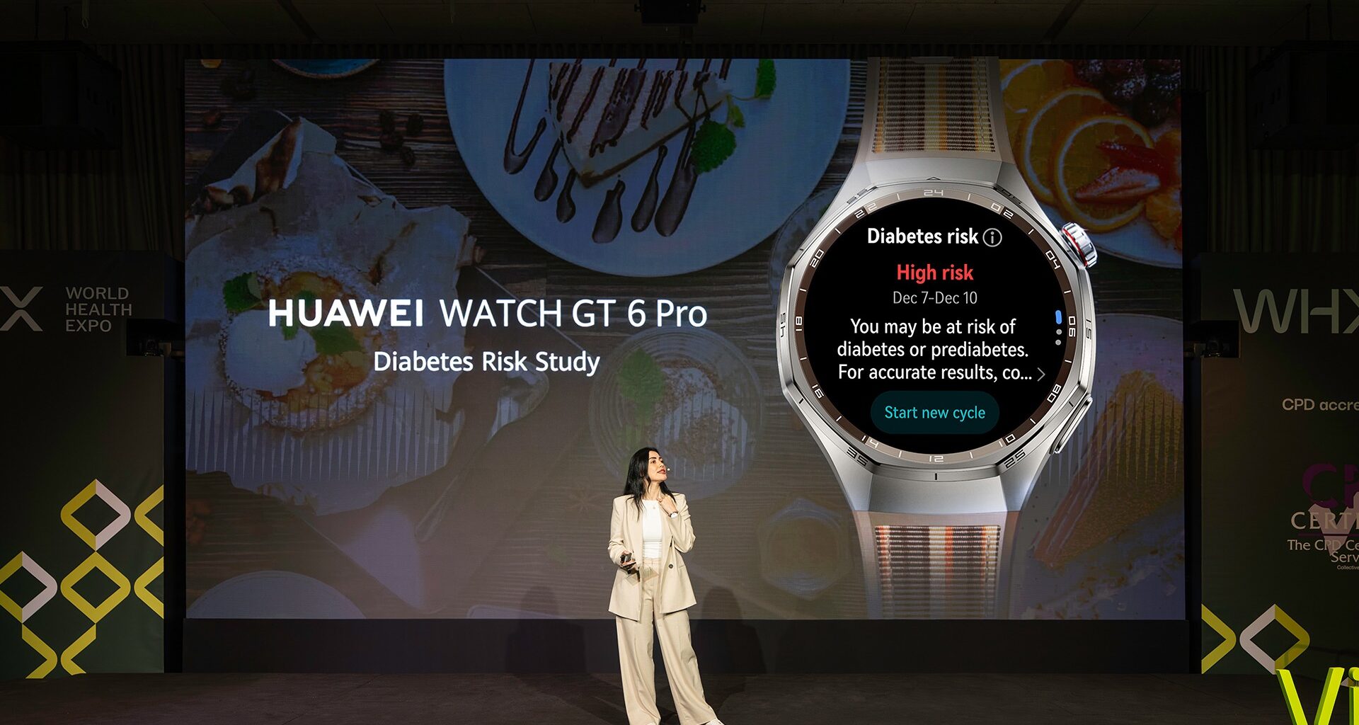 A Huawei executive announcing their new diabetes risk assessment feature on stage