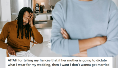 Man in brown sweater looking sad