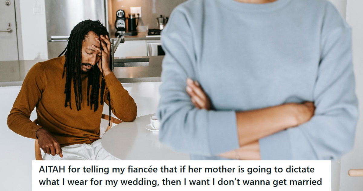 Man in brown sweater looking sad