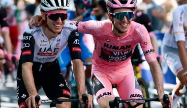 Adam Yates (l) celebrates with Simon Yates (r) as his brother heads towards victory in the 2025 Giro d'Italia