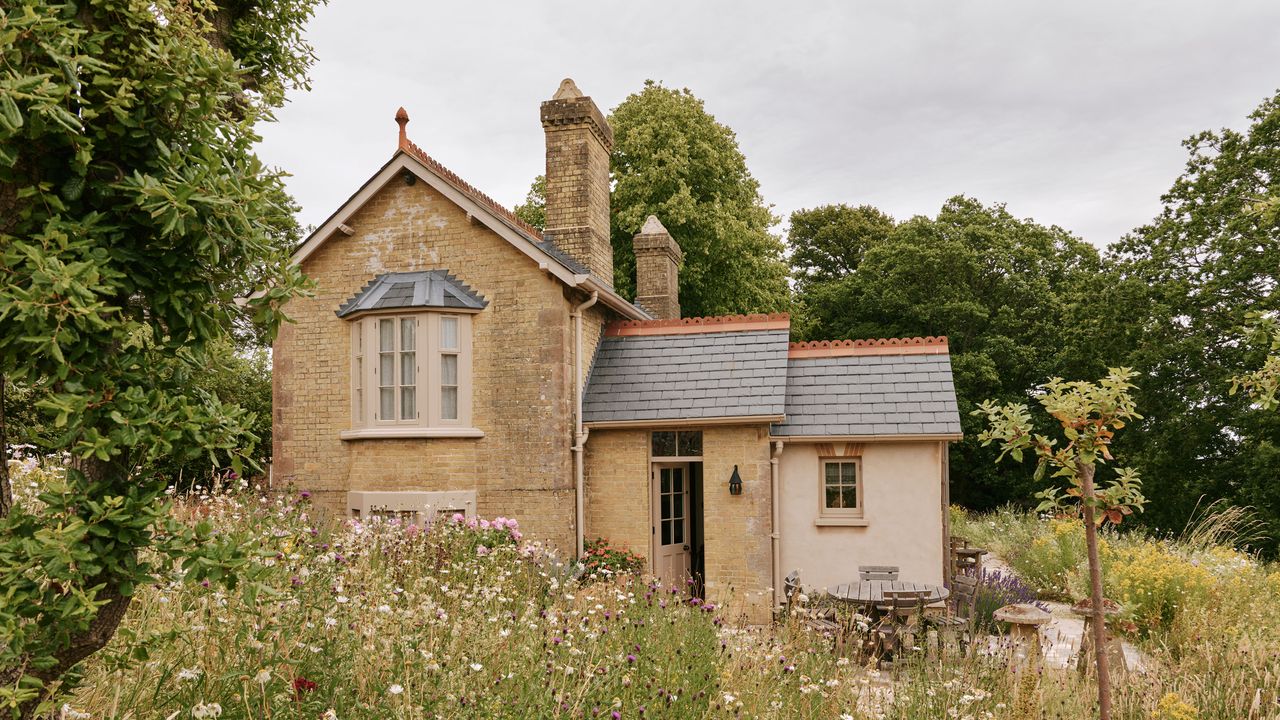An inviting Hampshire cottage with a warm and layered interior by Max Rollitt