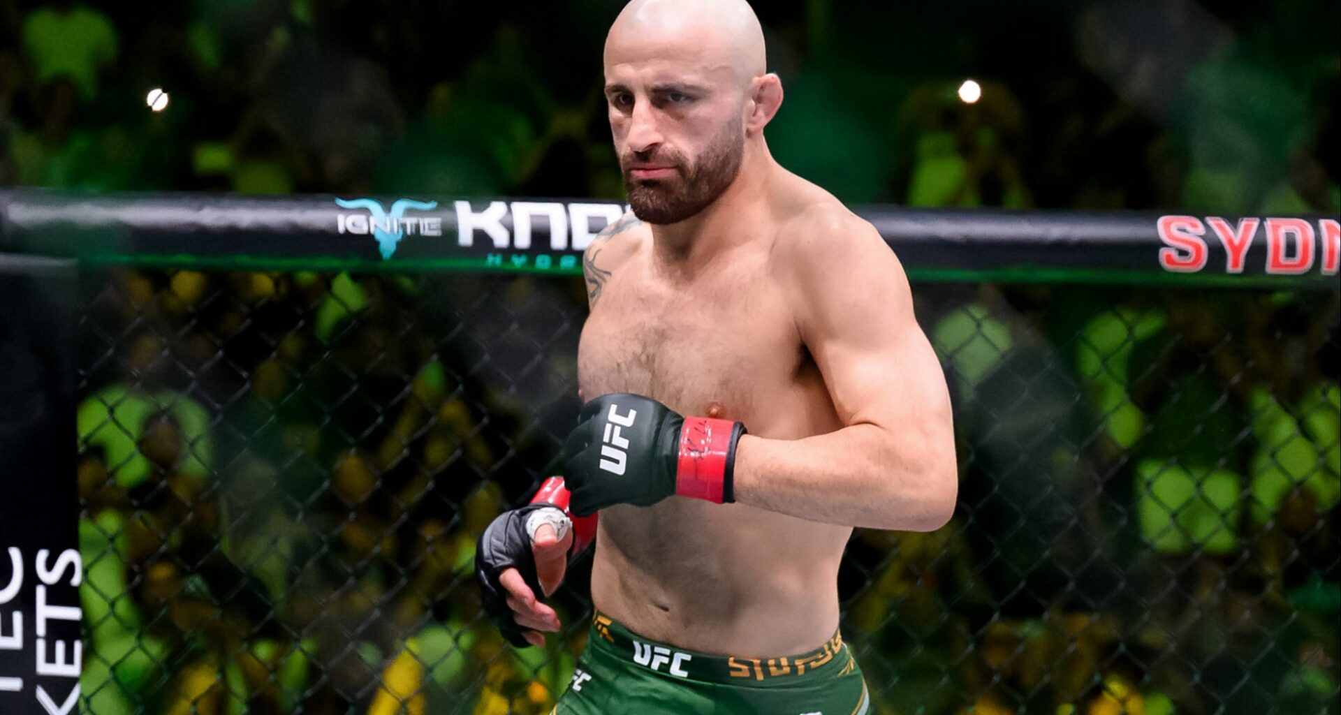 Alexander Volkanovski enters the Octagon for his fight at UFC 325