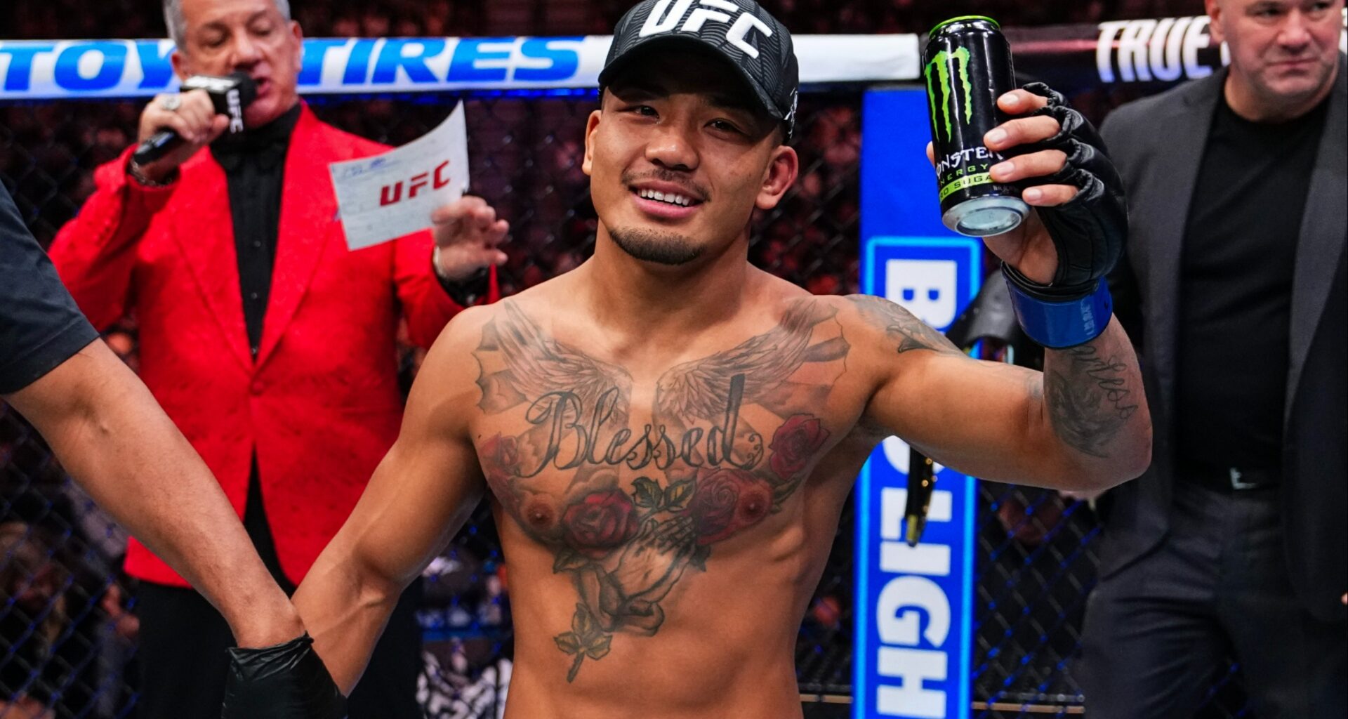 Joshua Van celebrates as the official decision is read at UFC 323