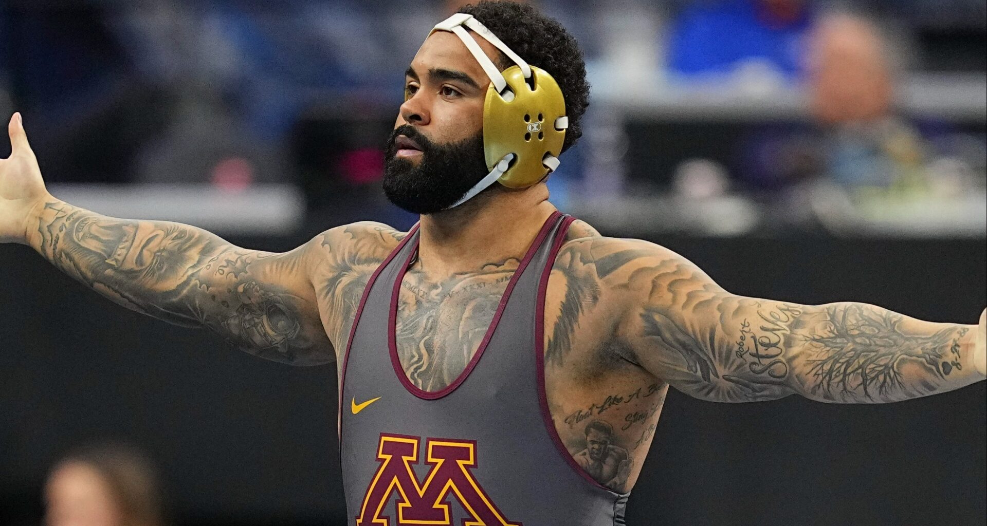 Gable Steveson celebrates a win at the NCAA Championships