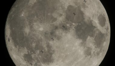 The full Moon fills the frame against a black sky, with multiple small silhouettes of the International Space Station captured as it transits across the Moon’s face.
