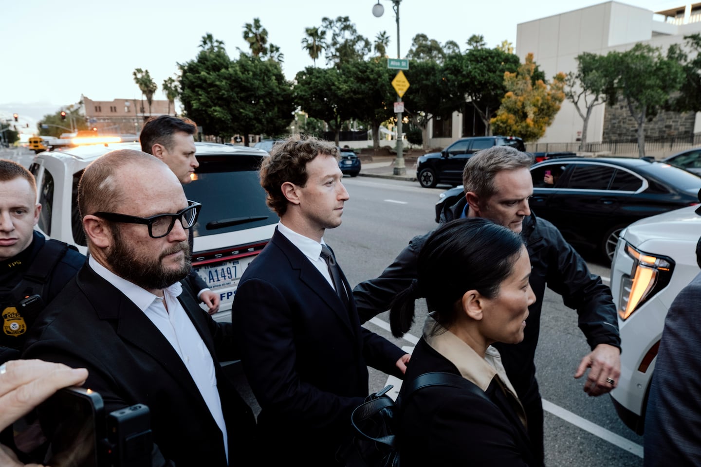 Mark Zuckerberg, center, Meta's chief executive, departs California Superior Court of Los Angeles County in Los Angeles on Feb. 18. Zuckerberg, who founded Facebook in his college dorm room in 2004, testified in a landmark tech addiction case against Meta and YouTube.