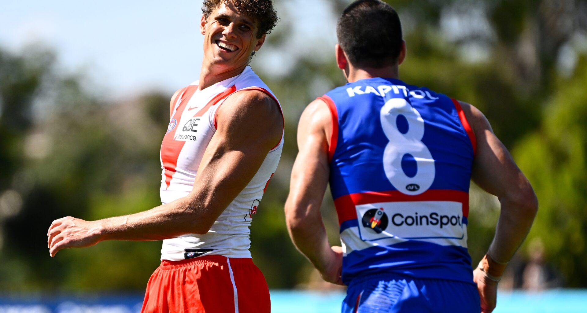 Curnow puts on a show as Swans sink Dogs