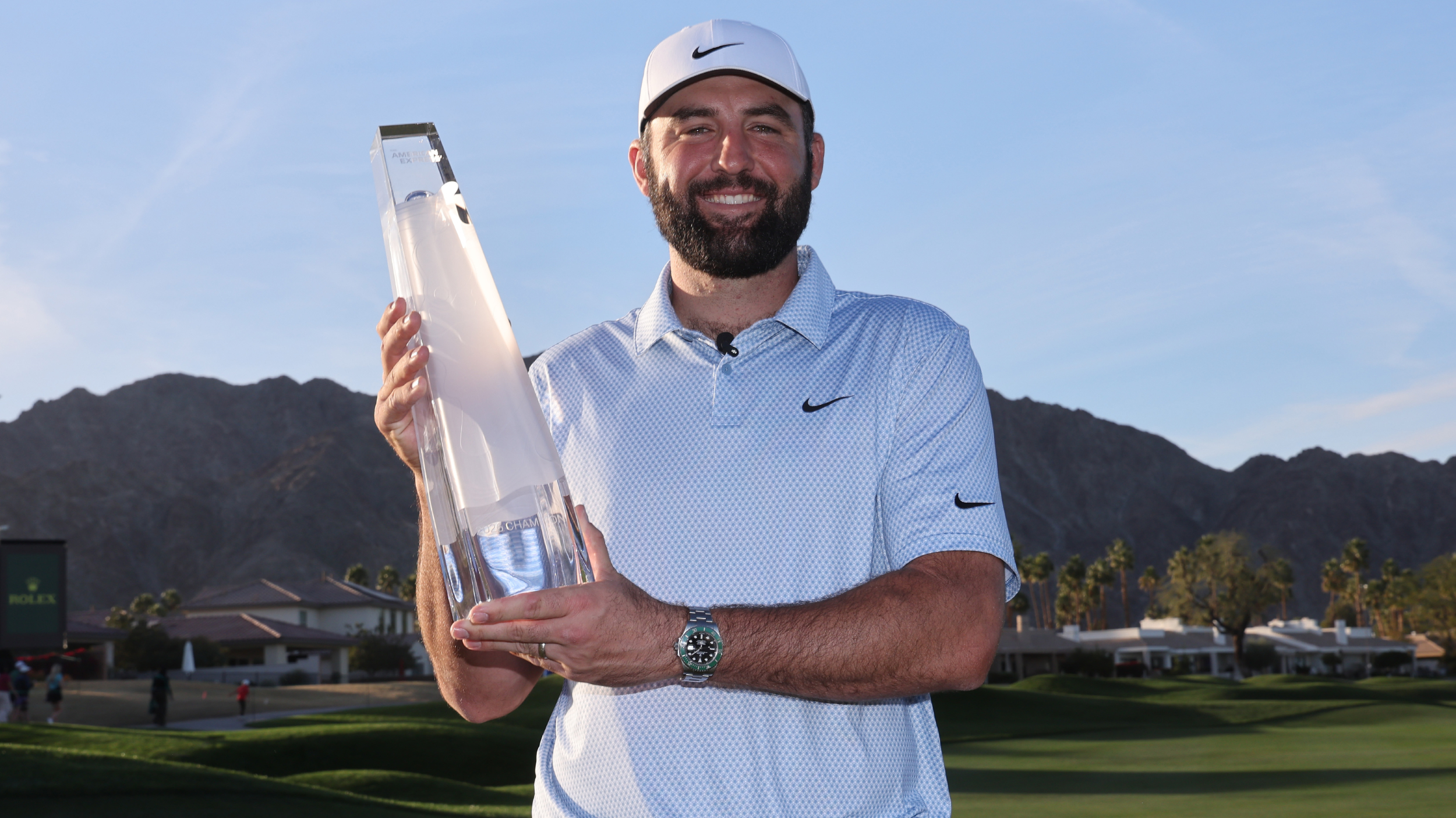 Scottie Scheffler with The American Express trophy