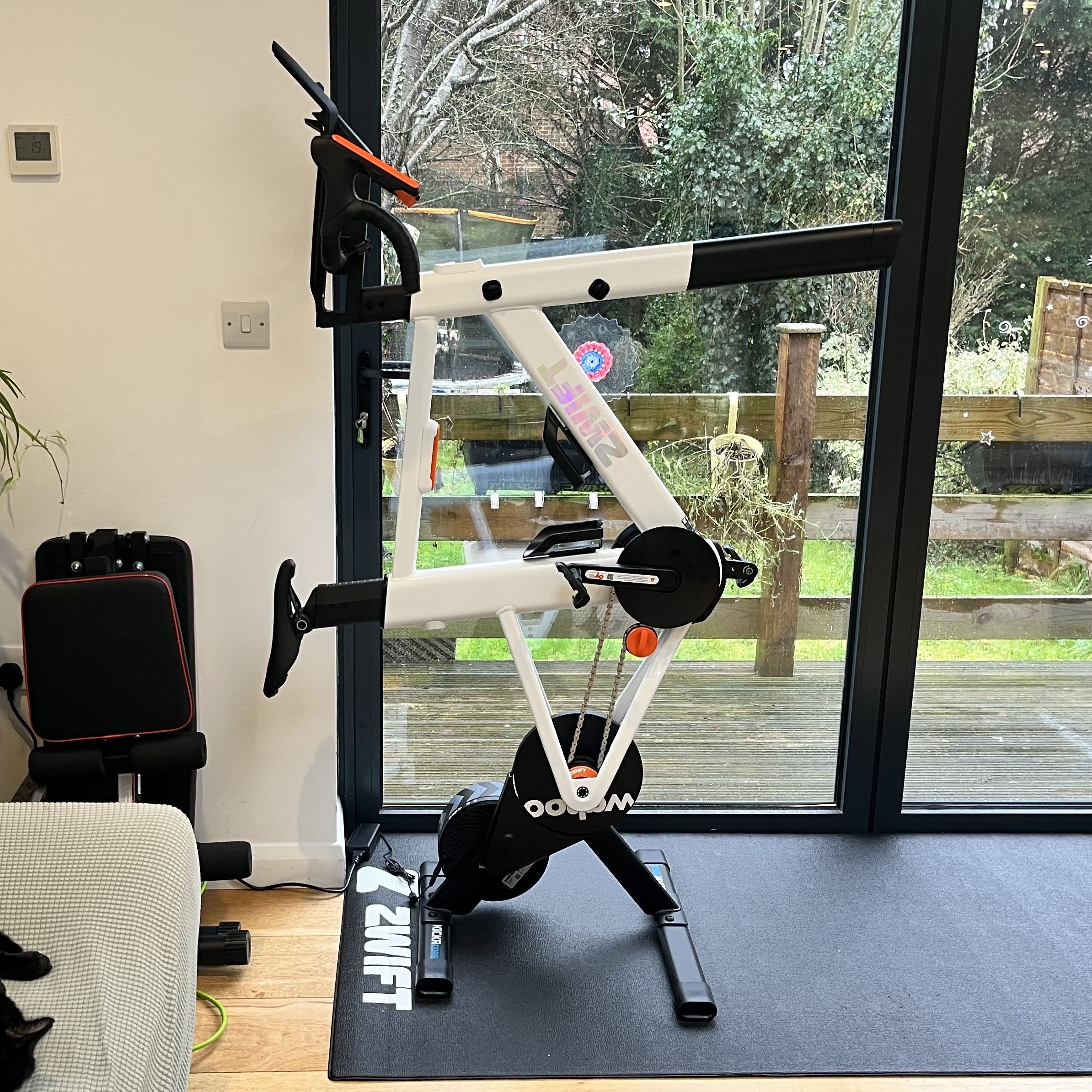 Zwift Ride bike with the frame vertical for storage