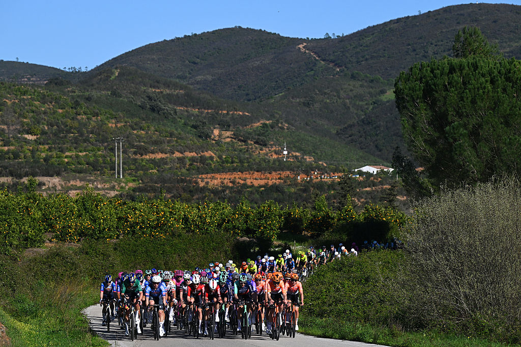 FOIA, PORTUGAL - FEBRUARY 19: A general view of the peloton competing during the 52nd Volta ao Algarve em Bicicleta 2026, Stage 2 a 183.5km stage from Portimao to Foia (Monchique) 882m on February 19, 2026 in Foia, Portugal. (Photo by Dario Belingheri/Getty Images)