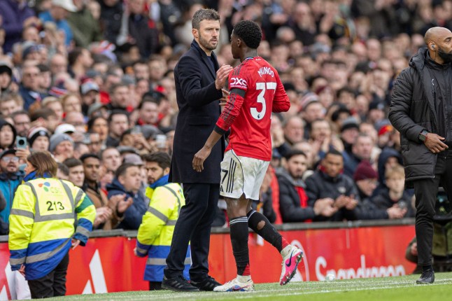 RESTRICTED TO EDITORIAL USE. No use with unauthorized audio, video, data, fixture lists, club/league logos or 'live' services. Online in-match use limited to 120 images, no video emulation. No use in betting, games or single club/league/player publications Mandatory Credit: Photo by MI News/NurPhoto/Shutterstock (16527534av) Michael Carrick and Kobbie Mainoo #37 of Manchester United F.C. participate in a substitution during the Premier League match between Manchester United and Tottenham Hotspur at Old Trafford in Manchester, England, on February 7, 2026. Manchester United v Tottenham Hotspur - Premier League, United Kingdom - 06 Feb 2026