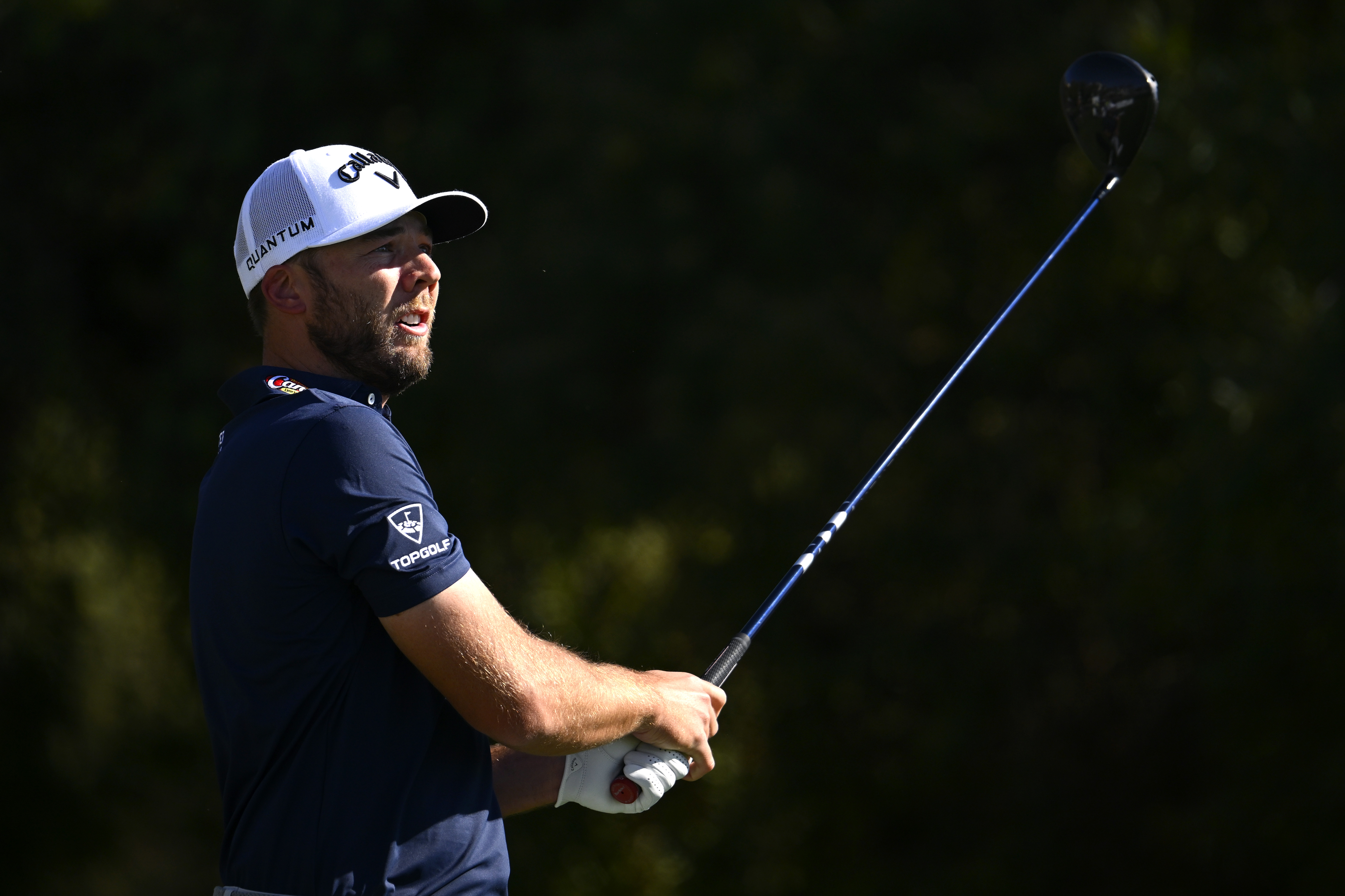 Sam Burns hits a driver off the tee