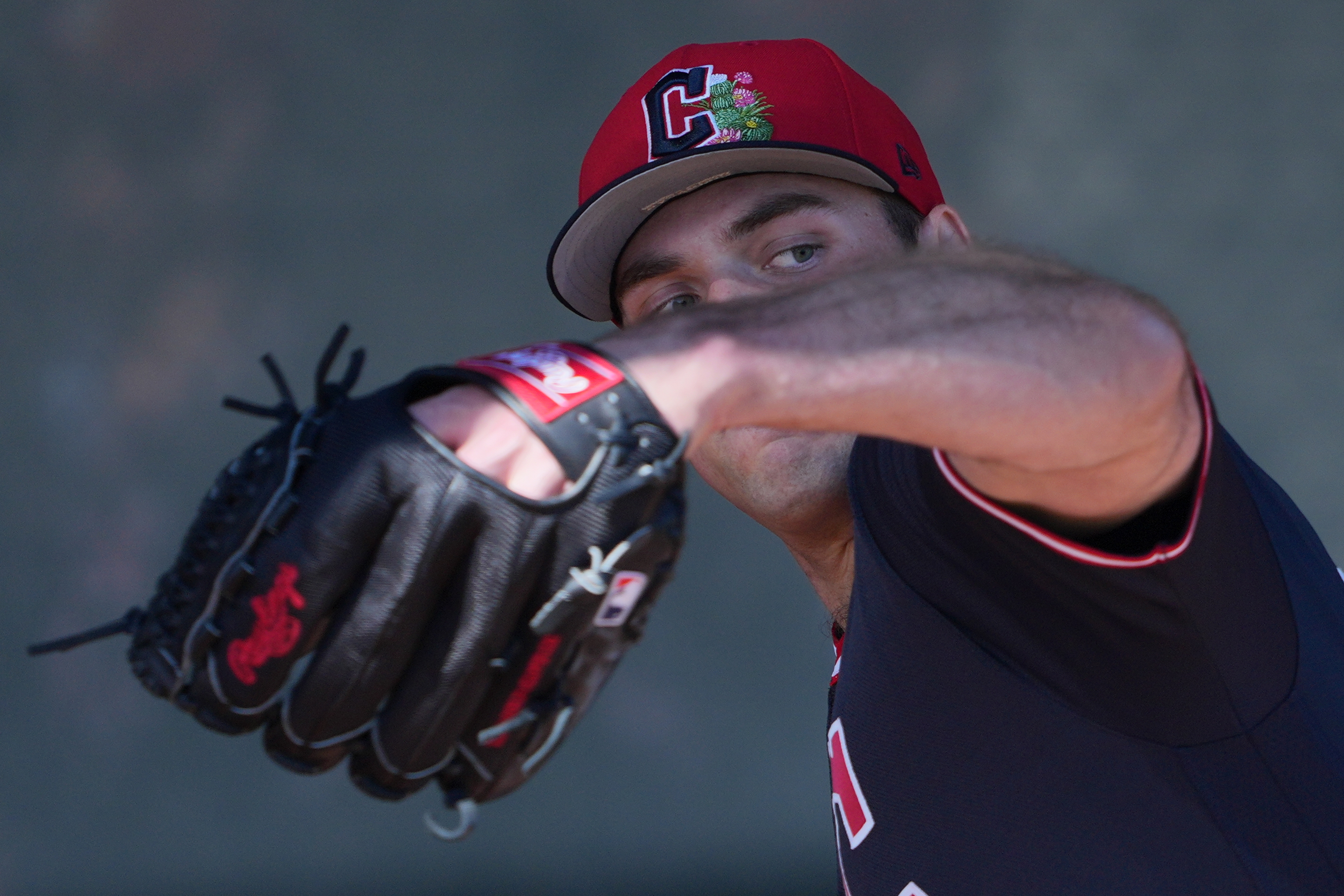 Cleveland Guardians pitcher Cade Smith works out during spring training...