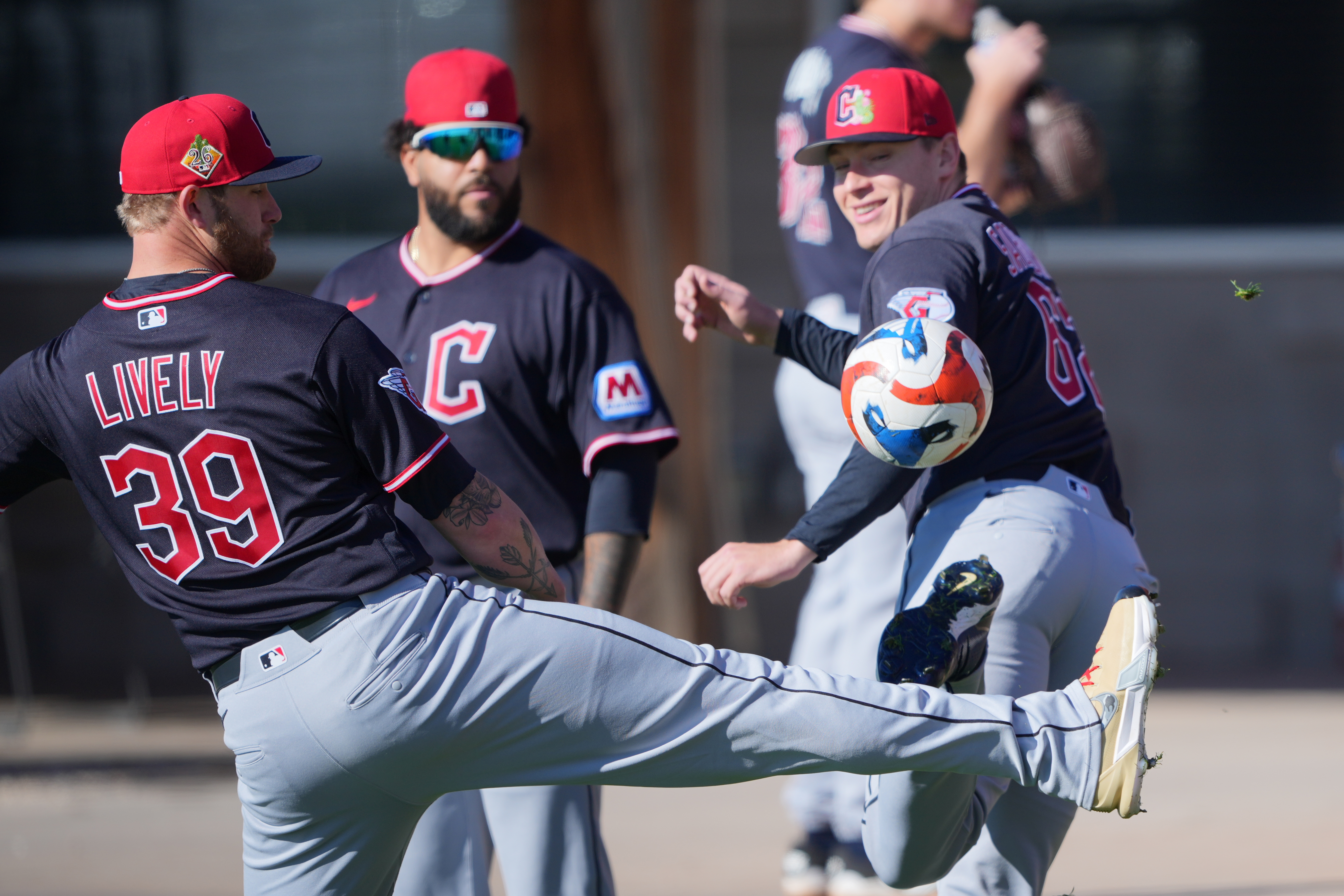 Cleveland Guardians pitcher Ben Lively warms up before work outs...