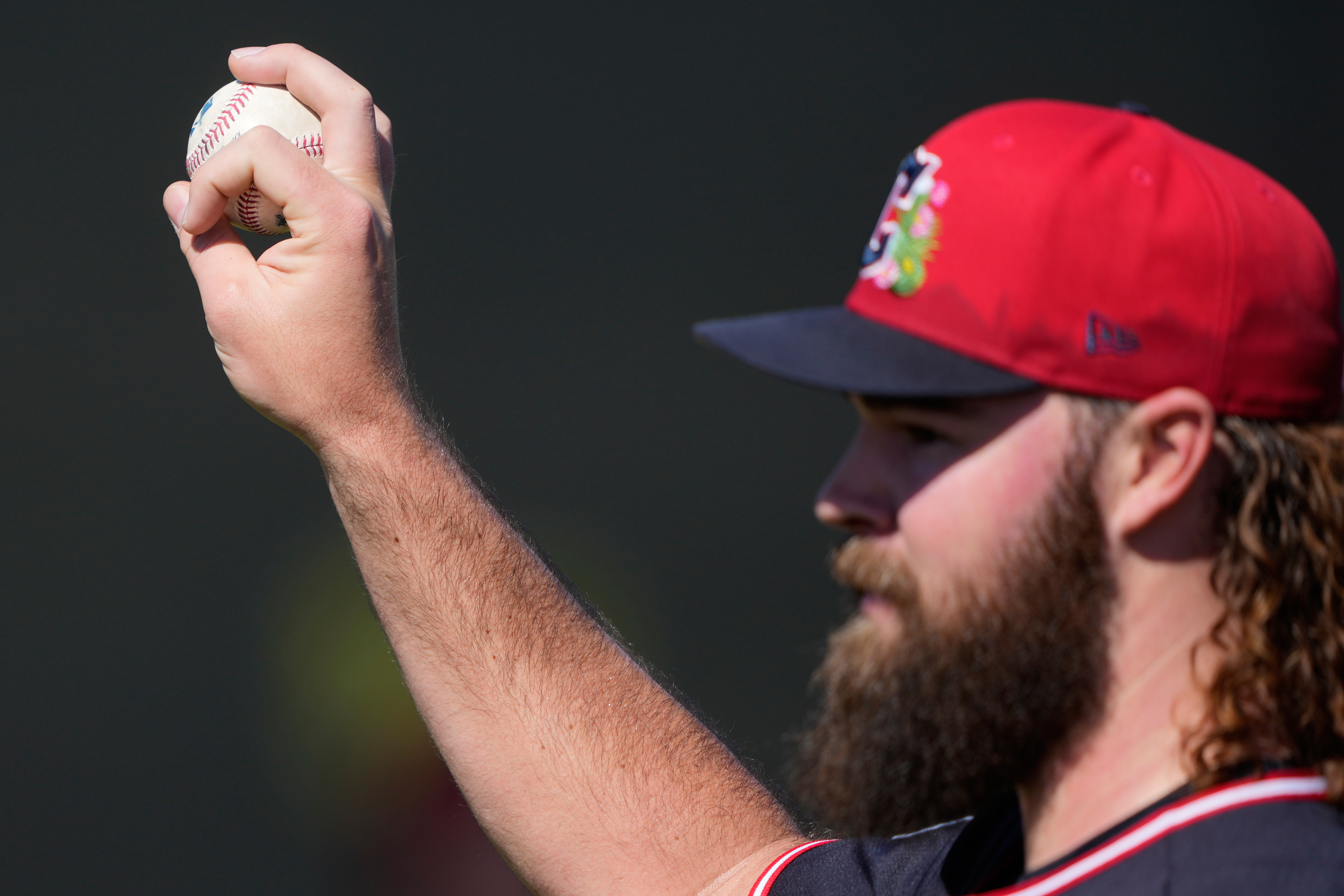 Cleveland Guardians pitcher Hunter Gaddis works out during spring training...