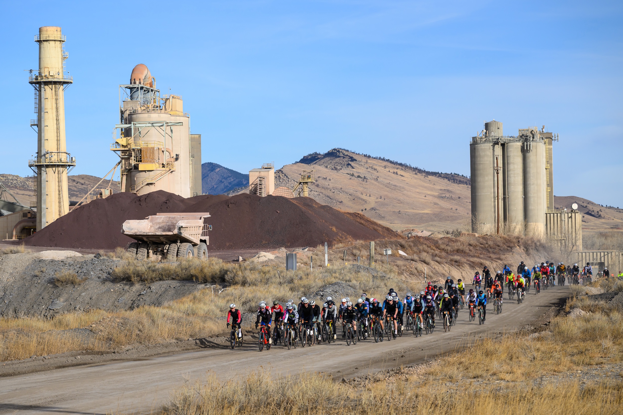 The peloton rides on sunny day at 2025 Old Man Winter