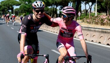 Team Visma-Lease a Bike's Belgian rider Wout Van Aert and Team Visma-Lease a Bike's British rider Simon Yates wearing the pink jersey of overall leader (Maglia Rosa) react as they ride during the 21st and last stage of the 108th Giro d'Italia cycling race of 143kms from Rome to Rome on June 1, 2025. (Photo by Luca Bettini / AFP)