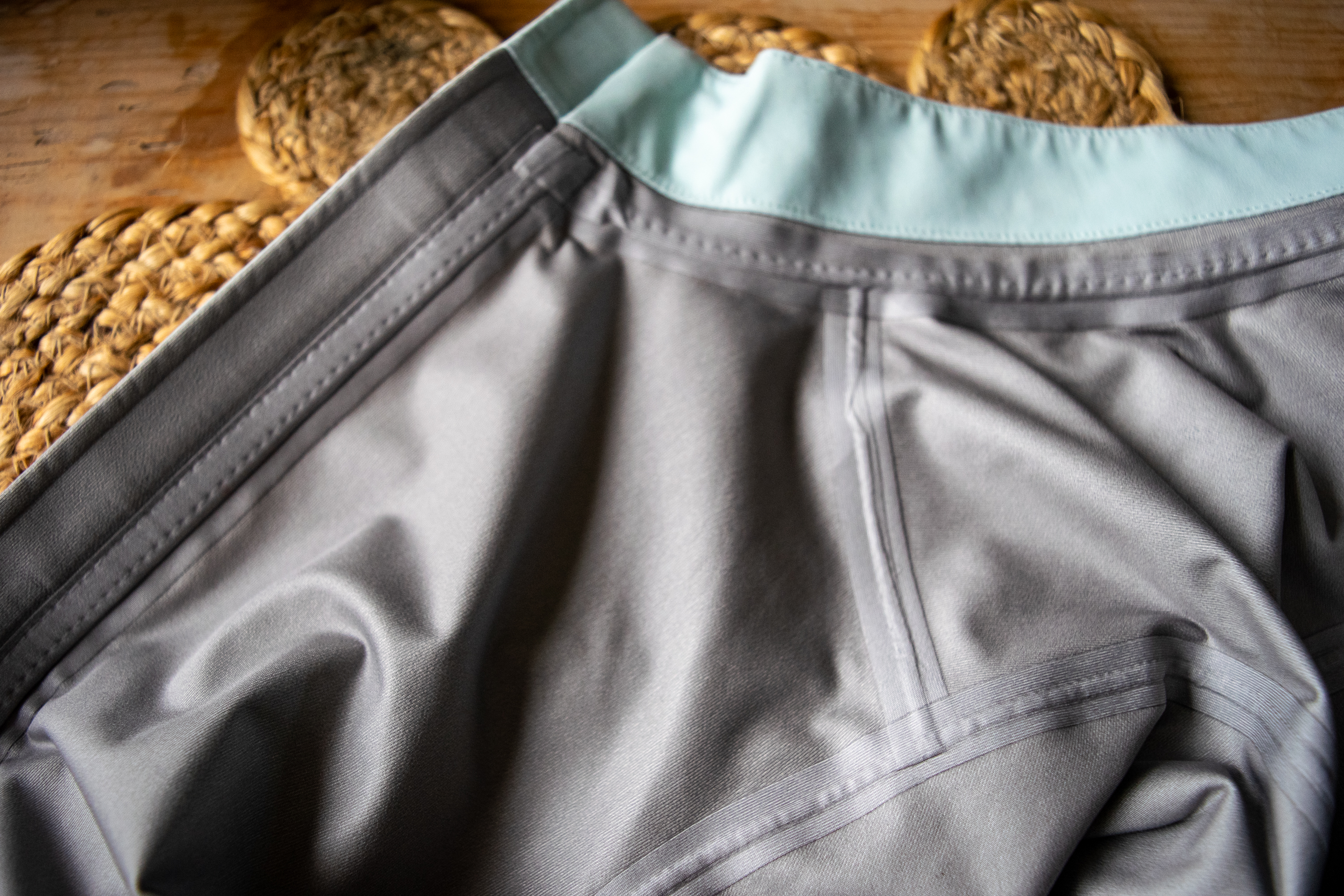 A man wearing a Rapha Shadow jersey