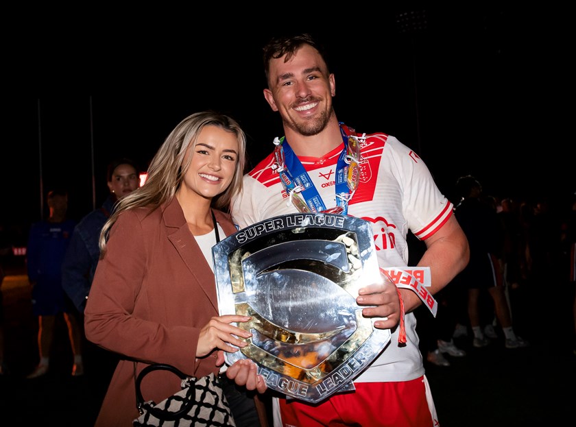 Jai Whitbread celebrate with wife Lauren after Hull KR won the 2025 Super League Leaders Trophy.