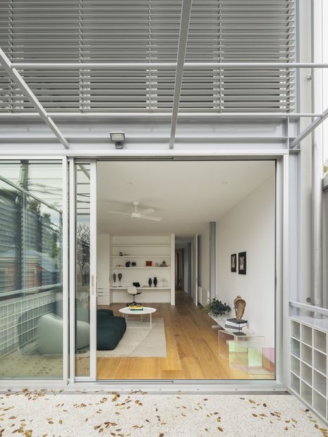 Sun-shaded windows and doors and a well-insulated roof and walls deliver sustainable comfort without air conditioning.