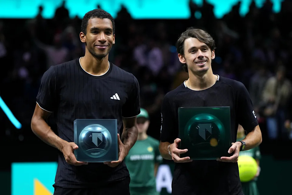 Pictured right to left, Alex de Minaur and Felix Auger-Aliassime after the Rotterdam Open final.