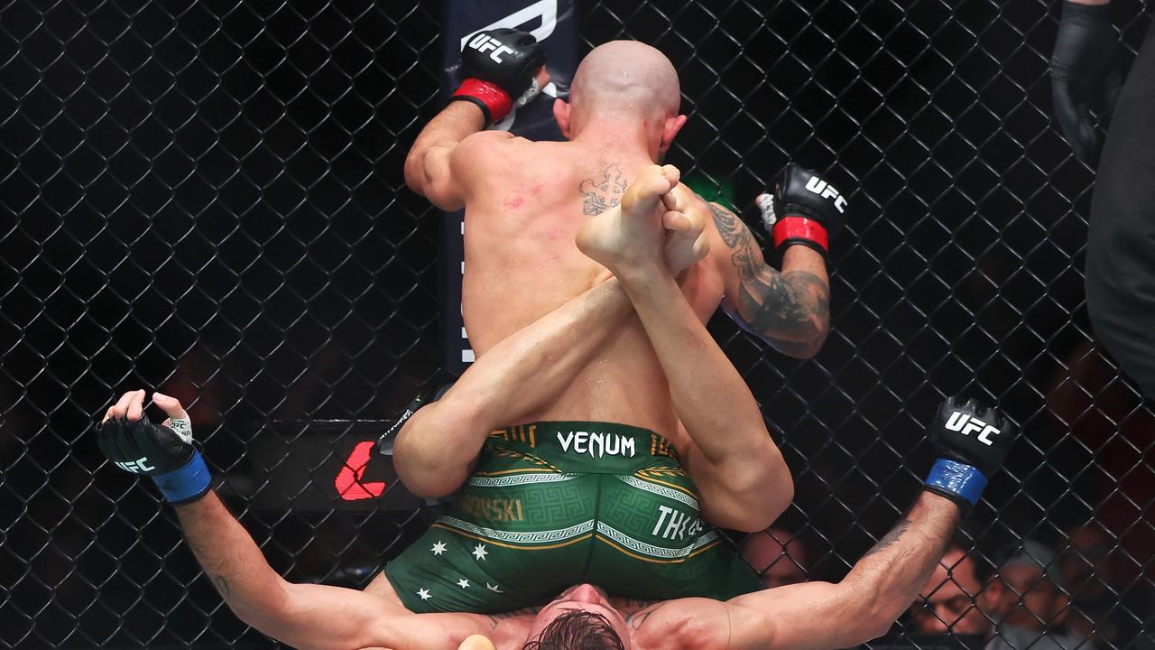 SYDNEY, AUSTRALIA - FEBRUARY 01: Alexander Volkanovski of Australia sits on Diego Lopes of Brazil in the featherweight title bout during the UFC 325: Volkanovski v Lopes 2 at Qudos Bank Arena on February 01, 2026 in Sydney, Australia. (Photo by Mark Kolbe Photography/Getty Images)