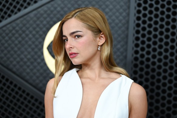 Addison Rae attends the 2026 Grammy Awards. Go the side part.