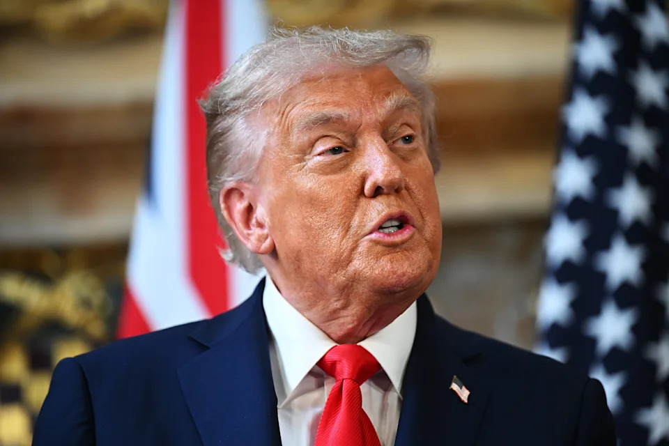 President Donald Trump was pressed over free speech on September 18, 2025, one day after Jimmy Kimmel's show was suspended following a threat from the president's FCC chair. / Leon Neal/Getty Images