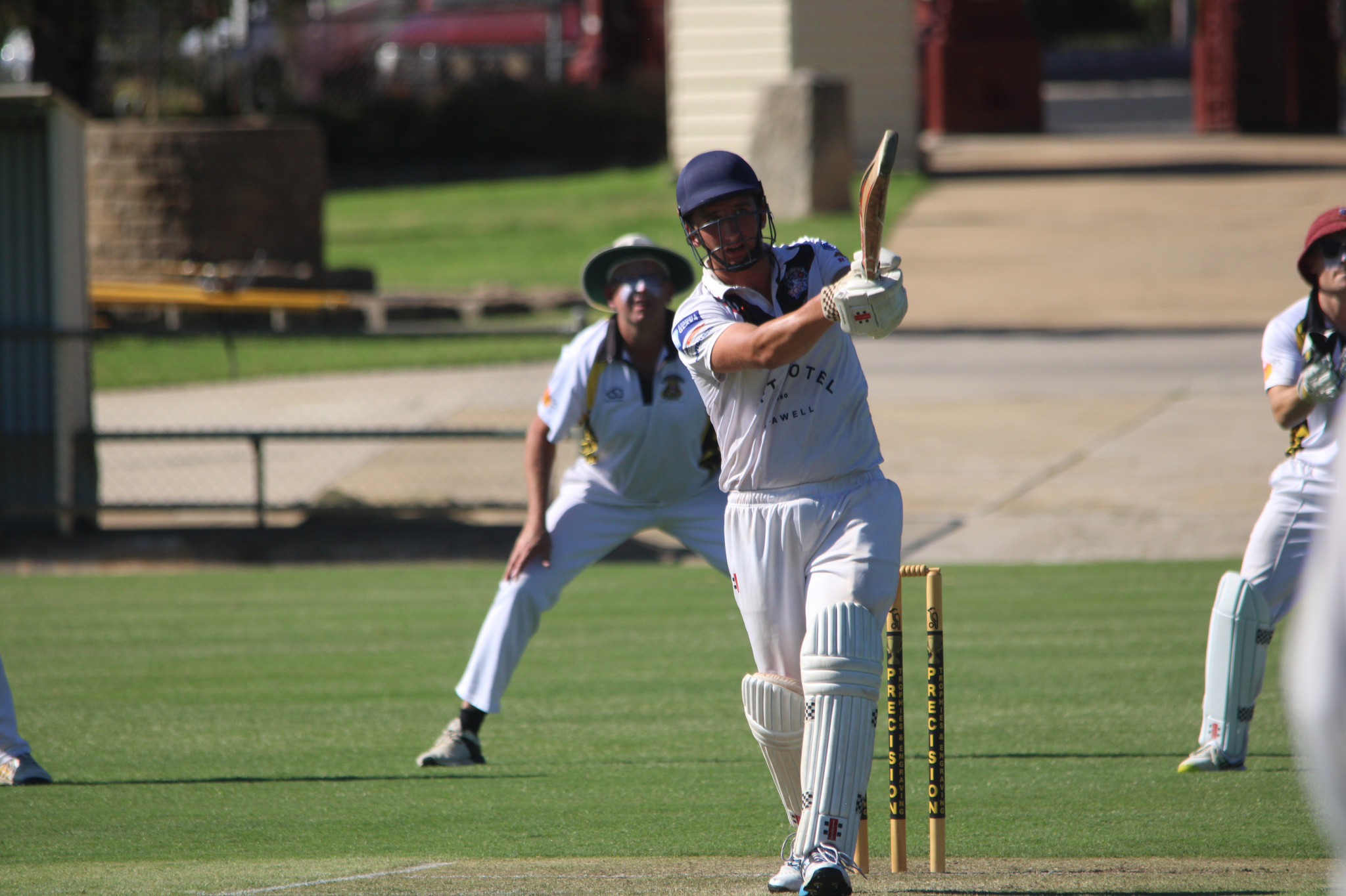 Combine's Jacob Dunn hits a six during his innings of 52 runs off 40 balls.