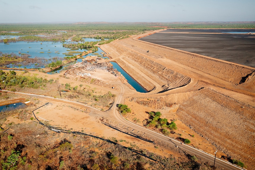 A large lead and zinc mine's waste minerals storage facility seen from above.