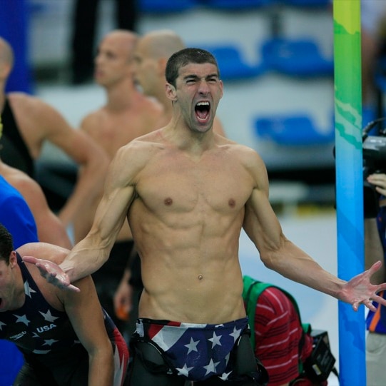 Michael Phelps bare-chested, wearing swimsuit screams.