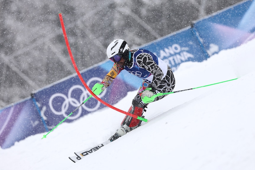 Shannon Abeda skis in a blizzard