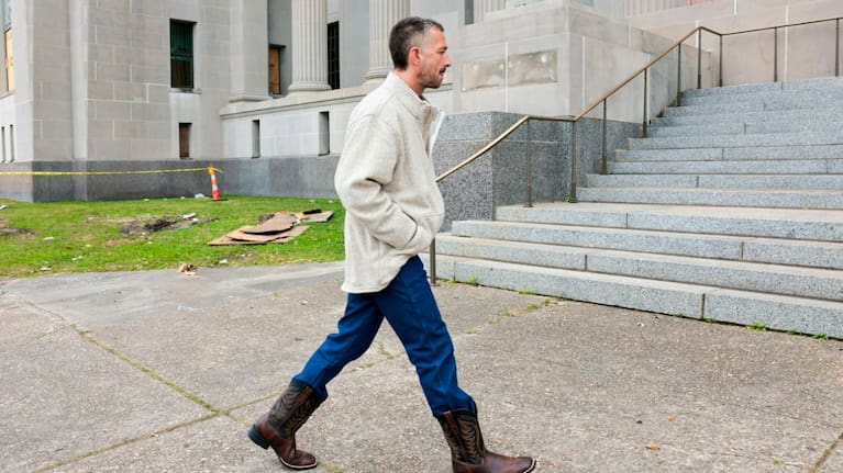 Actor Shia LaBeouf, who was arrested this month over an alleged assault outside a bar during Mardi Gras, enters New Orleans Criminal Court.