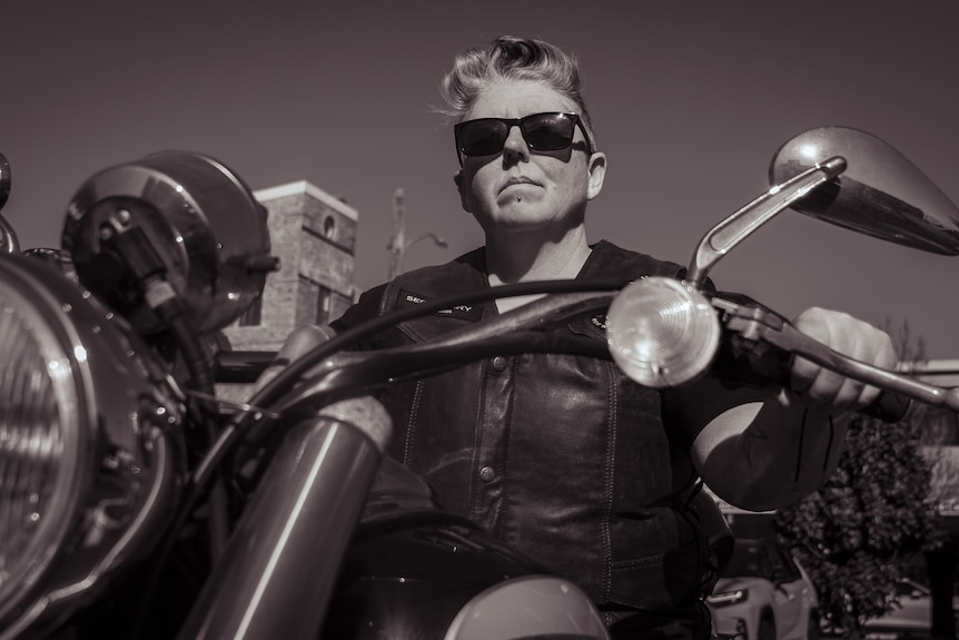 Woman on a motorbike.