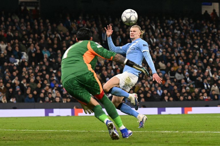 Manchester City's Norwegian striker #09 Erling Haaland reacts as he fails to make contact with a cross during the UEFA Champions League football match between Manchester City and Galatasaray at the Etihad Stadium in Manchester, north west England, on January 28, 2026. (Photo by Oli SCARFF / AFP)