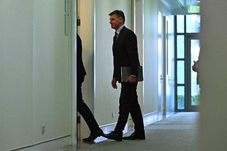 Angus Taylor arrives for a Liberal Party leadership spill at Parliament House on Friday.