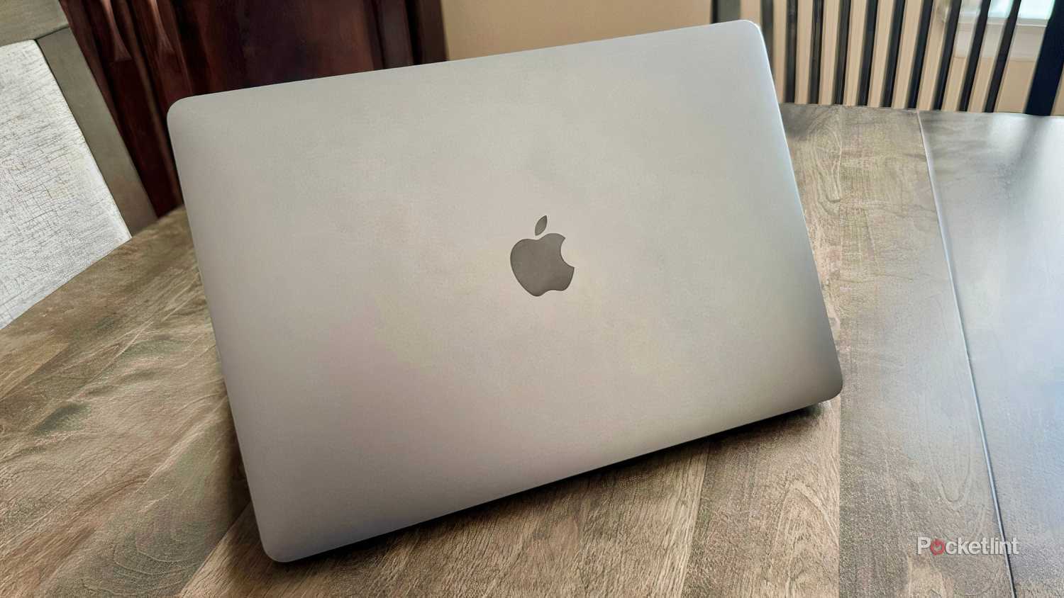 An Apple MacBook Air M1 model on a table.