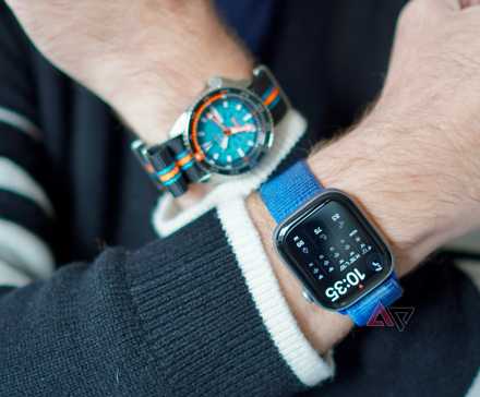 A person wearing a normal watch and an Apple Watch Series 11