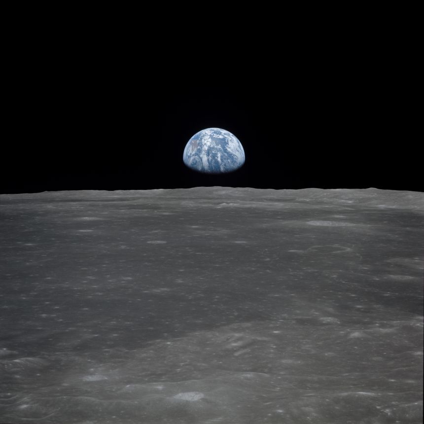Earth rises above the moon's horizon in a photograph taken in July 1969 from the Apollo 11 spacecraft.