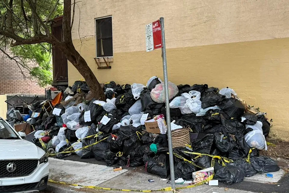 An enormous pile of household waste on Cathedral Street in Woolloomooloo.