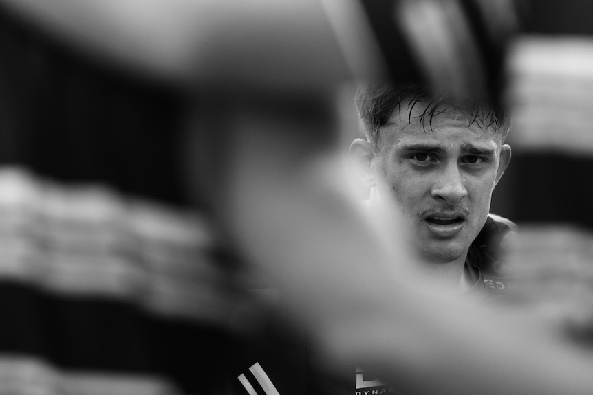 A man looks on during a rugby league training session