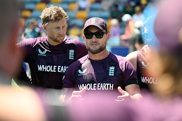 England coach Brendon McCullum speaks to his team in the huddle.