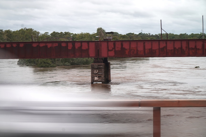 Markings on a pylon holding up a bridge show the water level at just over 15 metres 