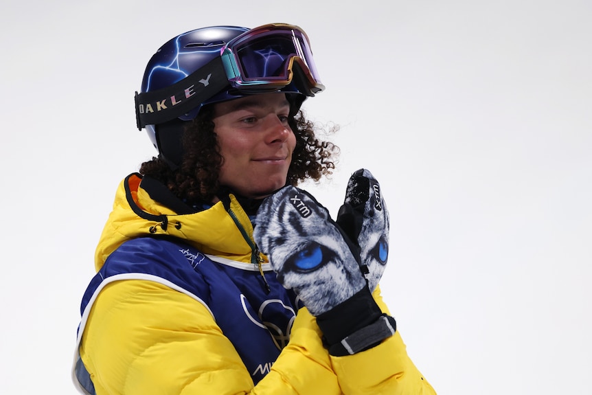 Valentino Guseli makes a gesture with his hands