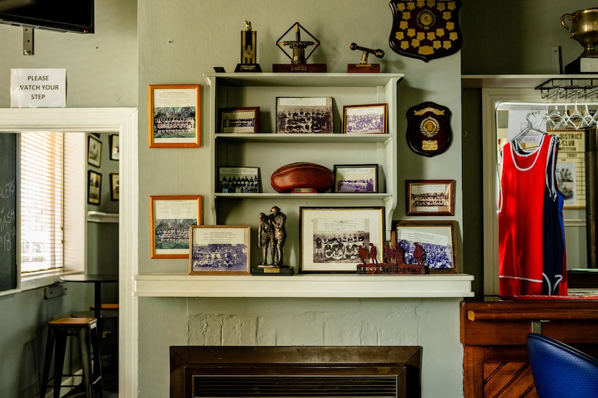 The walls of the Western Hotel in Balmoral is lined with photos from local football teams dating back centuries.