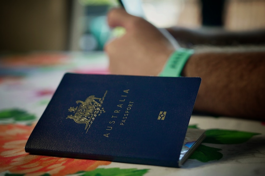 A close up of a passport on a table.