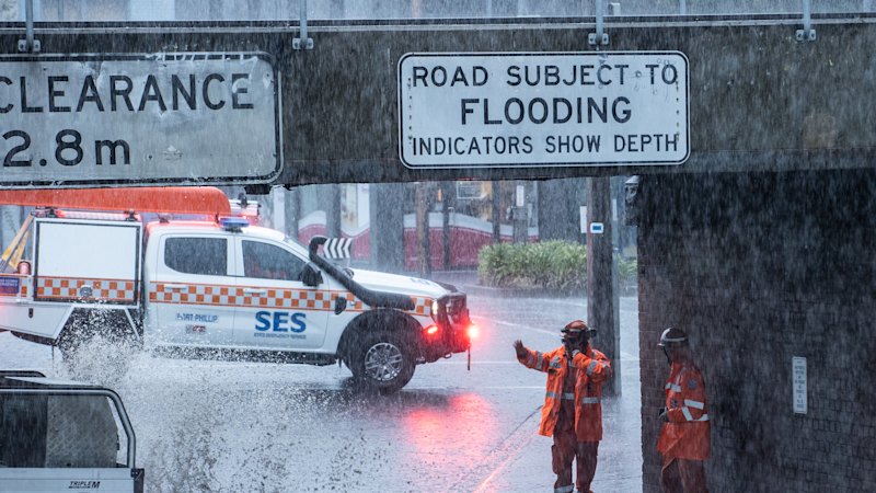 Delays at airport after deluge, widespread power outages; Emergency warnings ease; SES crews responding to almost 200 jobs
