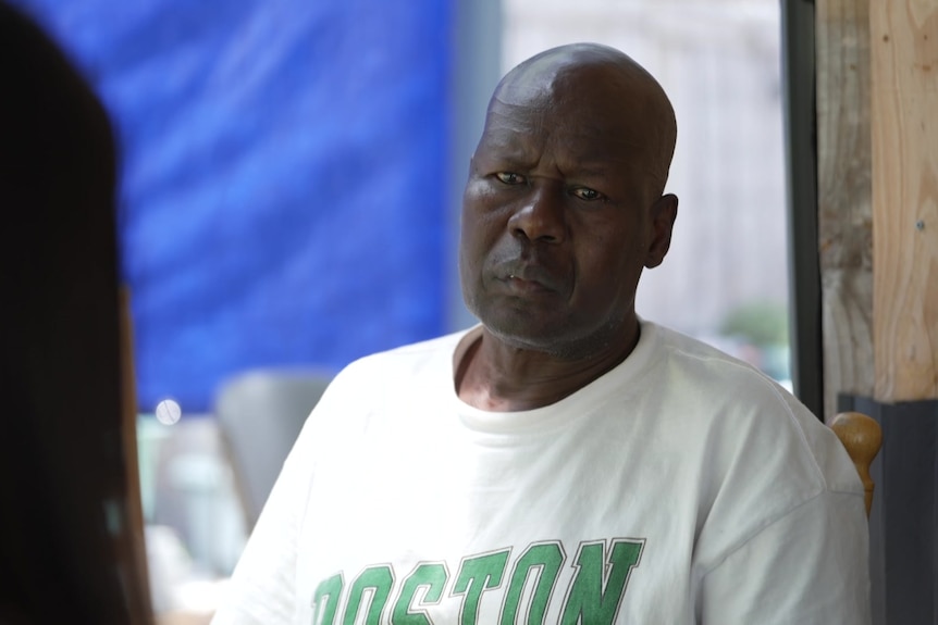 A man wearing a t-shirt.